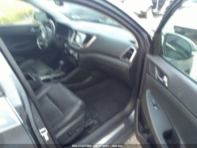 Photo 4 VIN: KM8J3CA27GU125167 - HYUNDAI TUCSON 