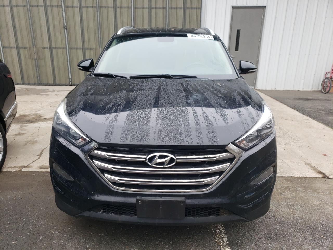 Photo 4 VIN: KM8J3CA27HU277404 - HYUNDAI TUCSON 