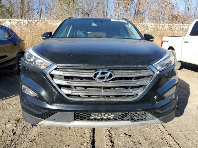 Photo 4 VIN: KM8J3CA27HU584538 - HYUNDAI TUCSON 