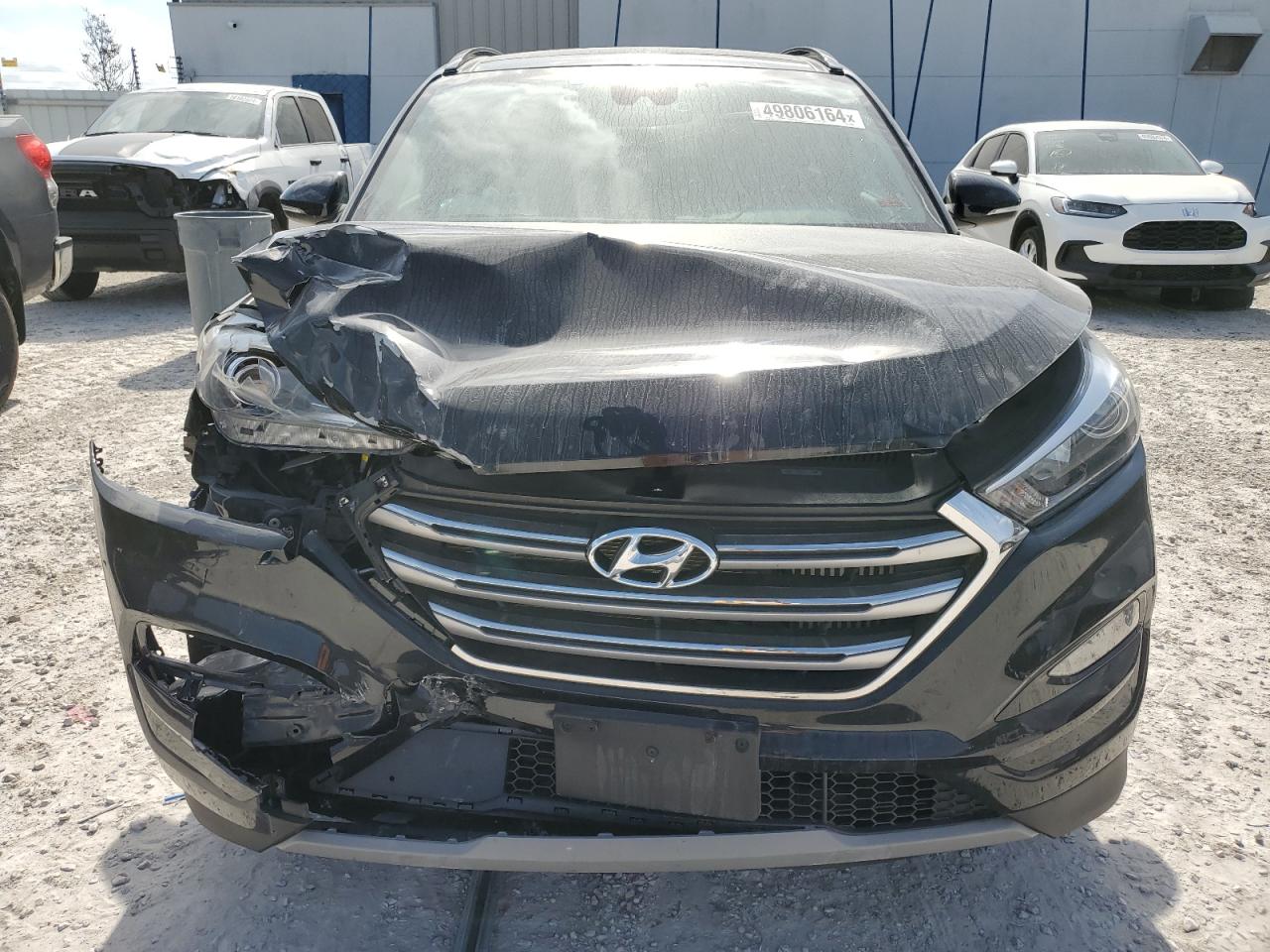 Photo 4 VIN: KM8J3CA28HU312001 - HYUNDAI TUCSON 