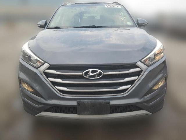 Photo 4 VIN: KM8J3CA28JU705695 - HYUNDAI TUCSON 