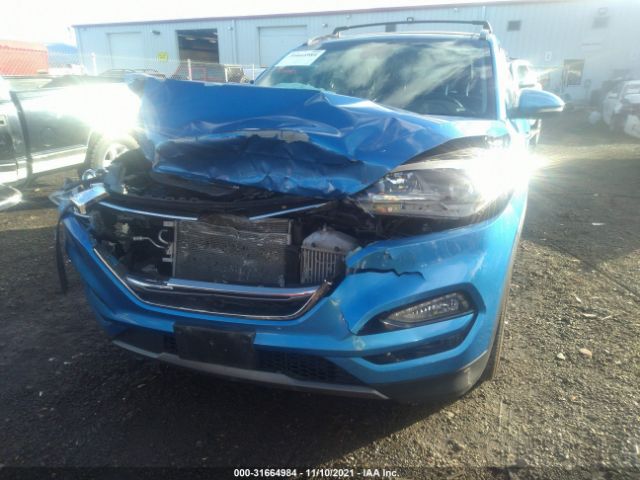 Photo 5 VIN: KM8J3CA29GU104465 - HYUNDAI TUCSON 