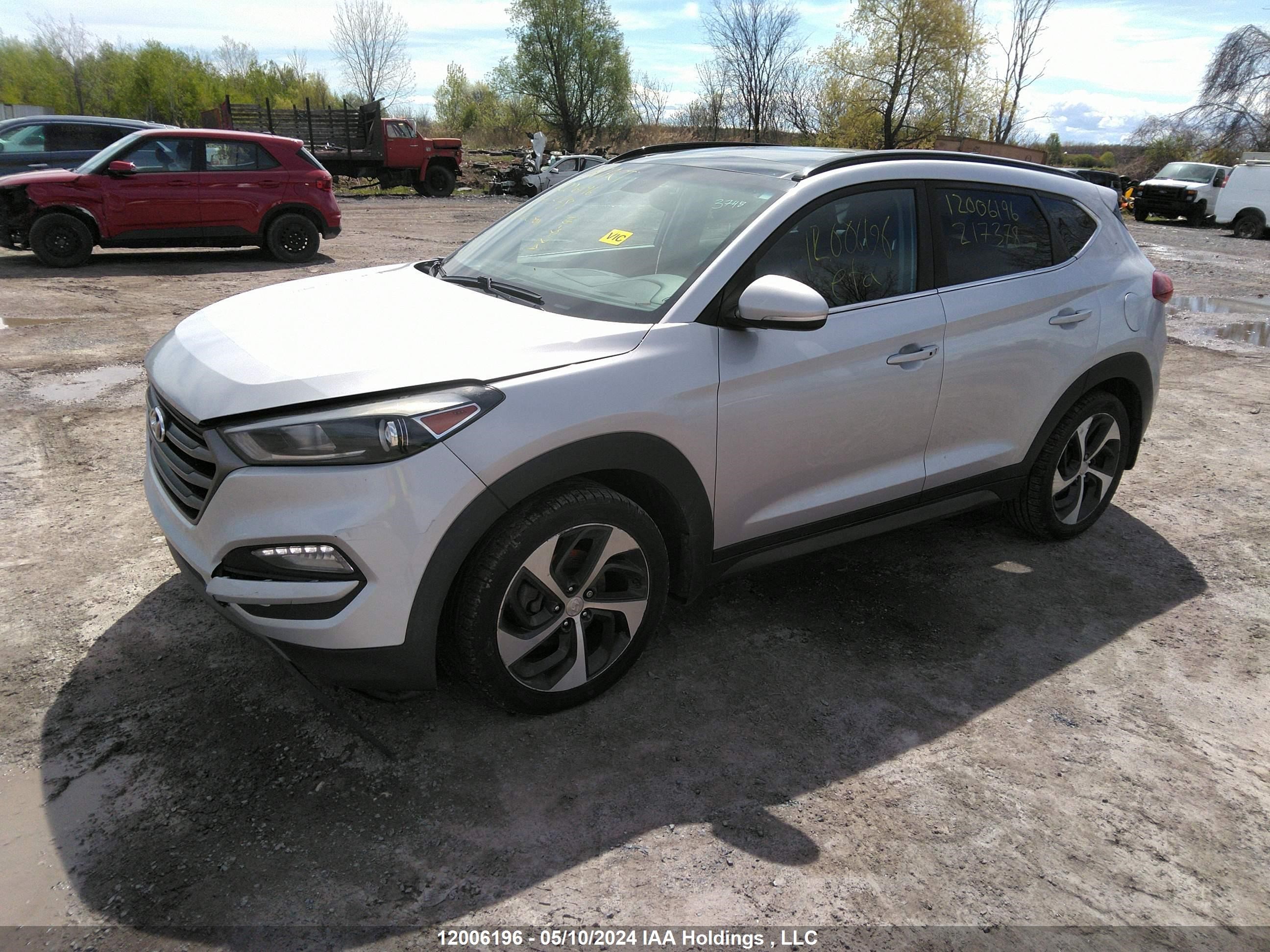 Photo 1 VIN: KM8J3CA29GU217378 - HYUNDAI TUCSON 