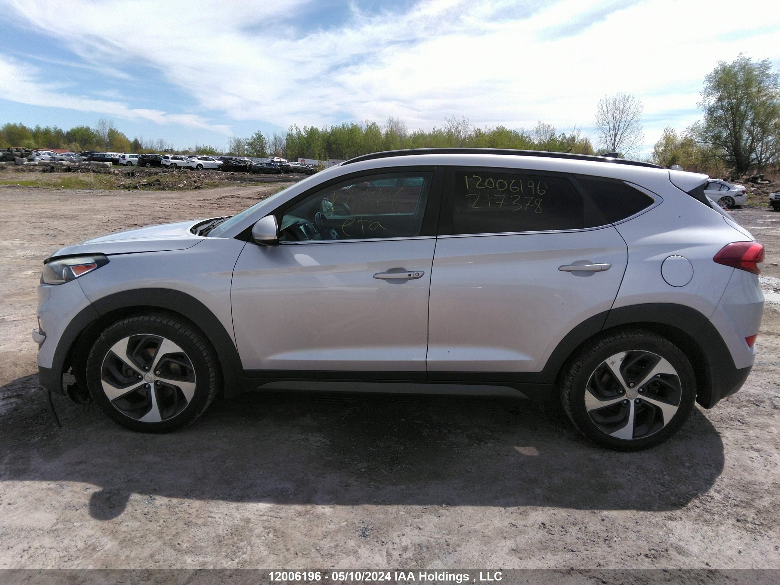 Photo 13 VIN: KM8J3CA29GU217378 - HYUNDAI TUCSON 