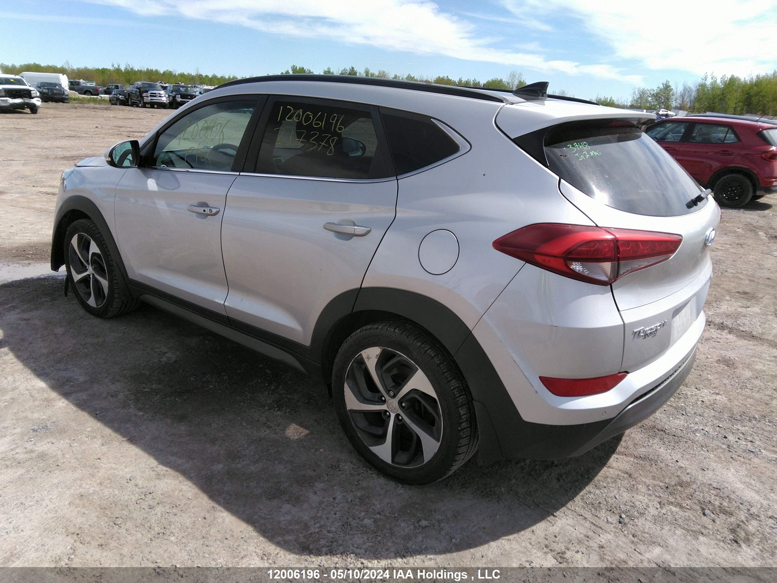 Photo 2 VIN: KM8J3CA29GU217378 - HYUNDAI TUCSON 