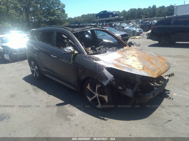 Photo 0 VIN: KM8J3CA29JU833380 - HYUNDAI TUCSON 