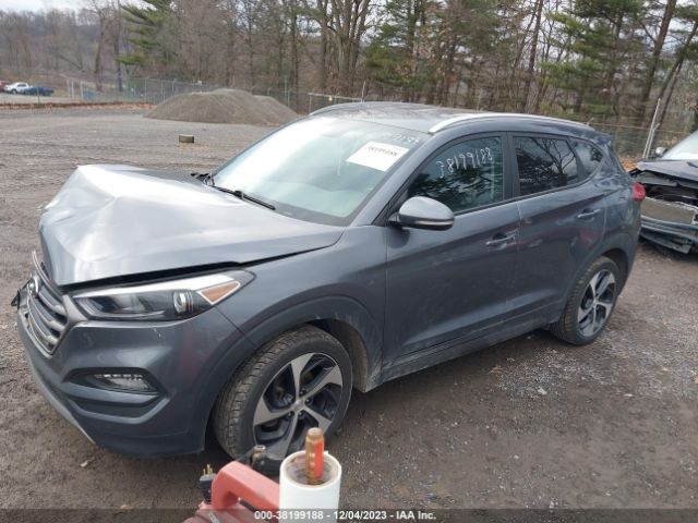 Photo 1 VIN: KM8J3CA2XGU113272 - HYUNDAI TUCSON 