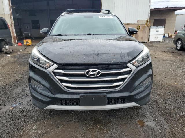 Photo 4 VIN: KM8J3CA2XHU446699 - HYUNDAI TUCSON LIM 