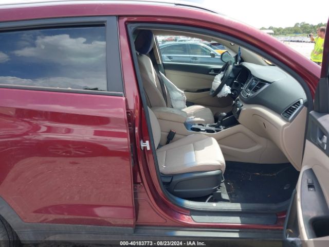 Photo 4 VIN: KM8J3CA40GU022559 - HYUNDAI TUCSON 