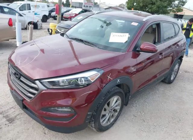 Photo 1 VIN: KM8J3CA40GU119342 - HYUNDAI TUCSON 