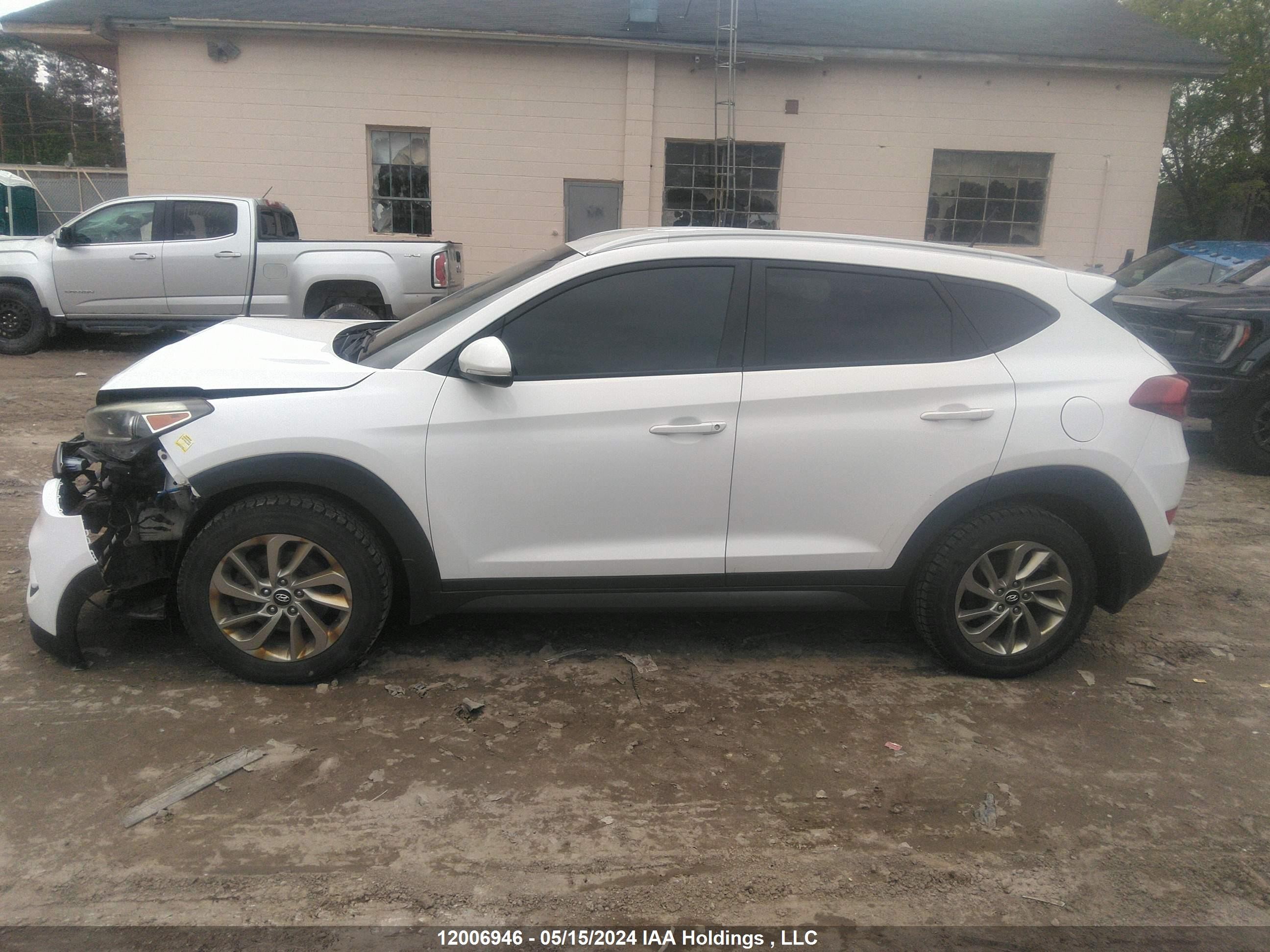 Photo 14 VIN: KM8J3CA40GU215360 - HYUNDAI TUCSON 