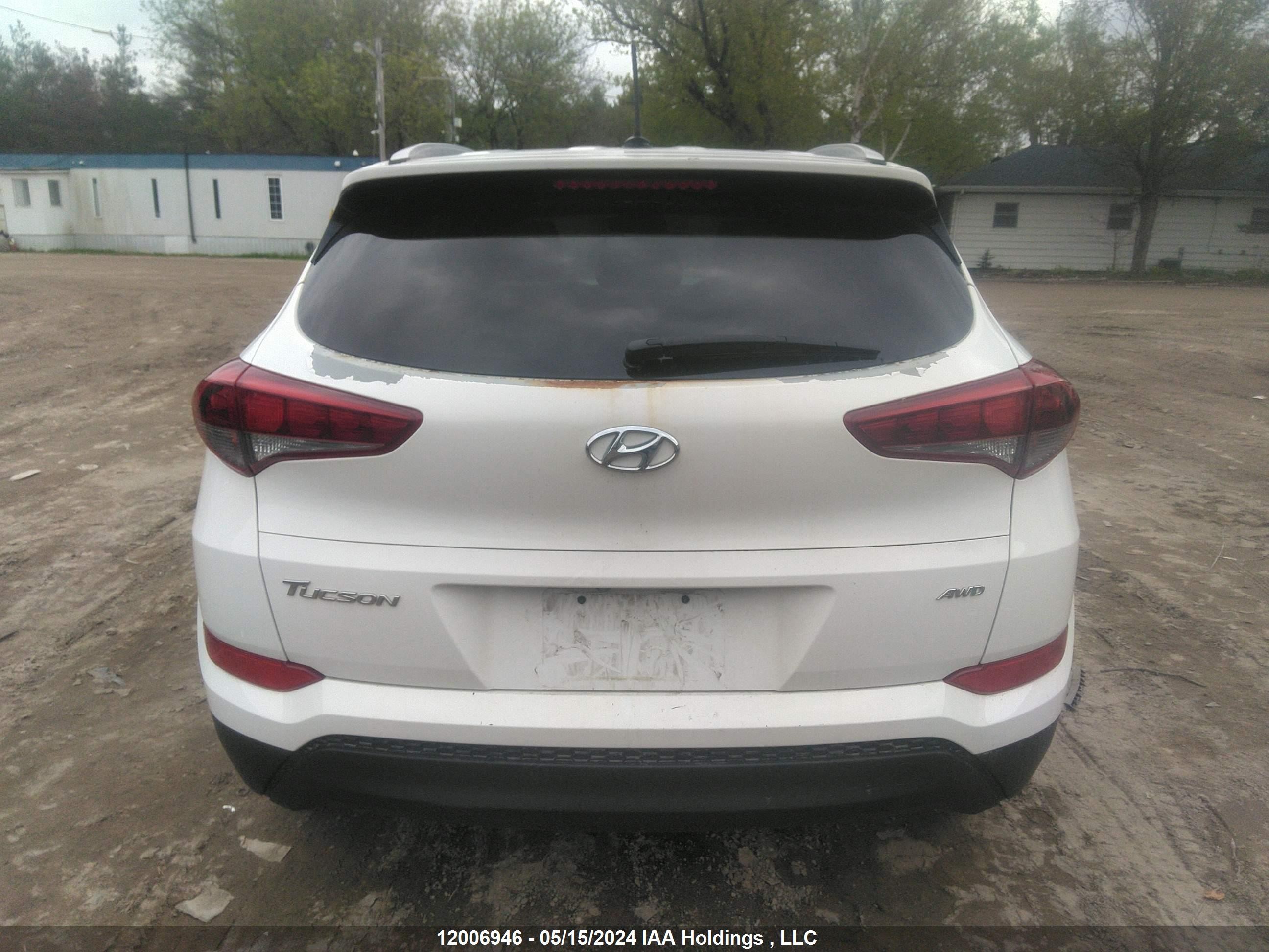 Photo 16 VIN: KM8J3CA40GU215360 - HYUNDAI TUCSON 