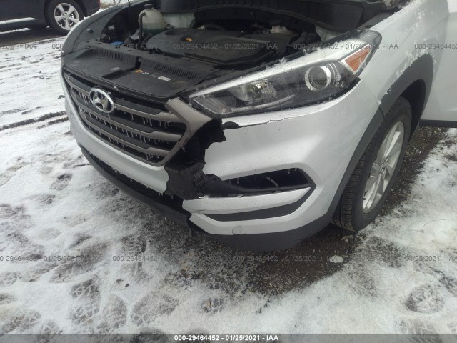 Photo 5 VIN: KM8J3CA40GU259049 - HYUNDAI TUCSON 