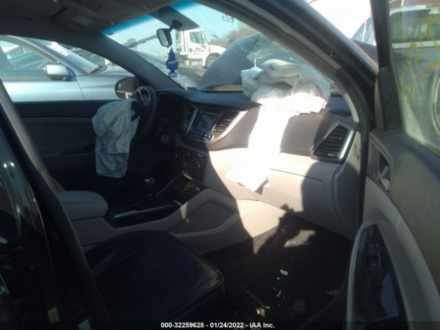 Photo 4 VIN: KM8J3CA40GU259939 - HYUNDAI TUCSON 