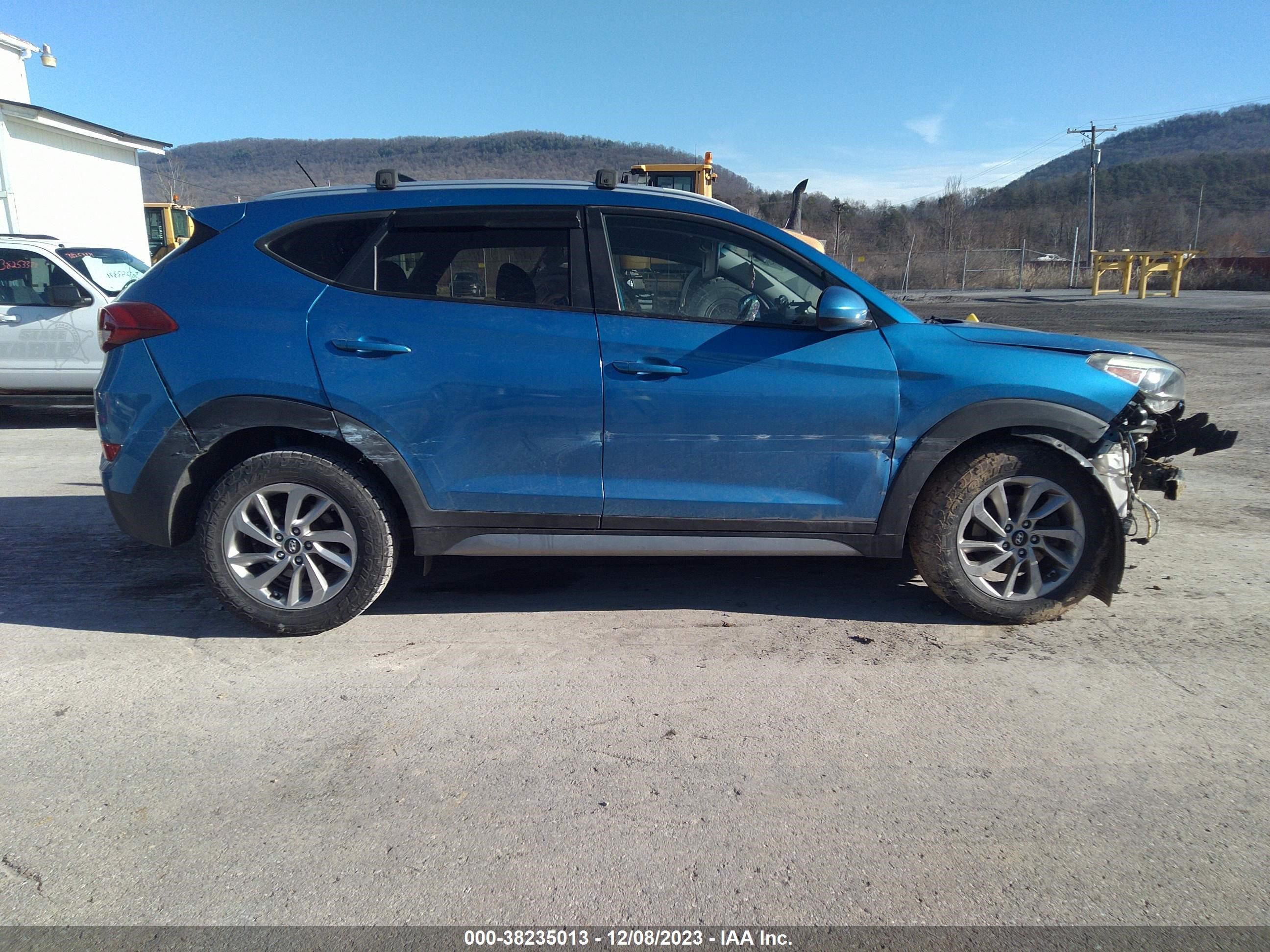 Photo 12 VIN: KM8J3CA40HU317551 - HYUNDAI TUCSON 