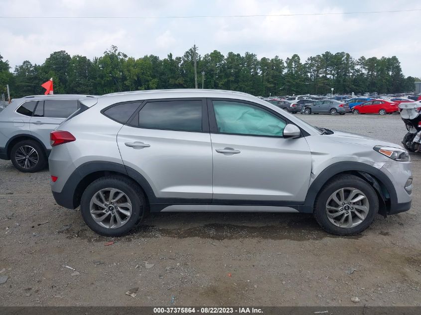 Photo 12 VIN: KM8J3CA40HU556114 - HYUNDAI TUCSON 