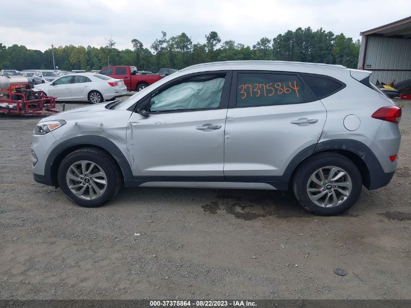 Photo 13 VIN: KM8J3CA40HU556114 - HYUNDAI TUCSON 