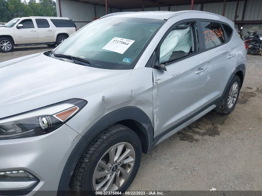 Photo 5 VIN: KM8J3CA40HU556114 - HYUNDAI TUCSON 