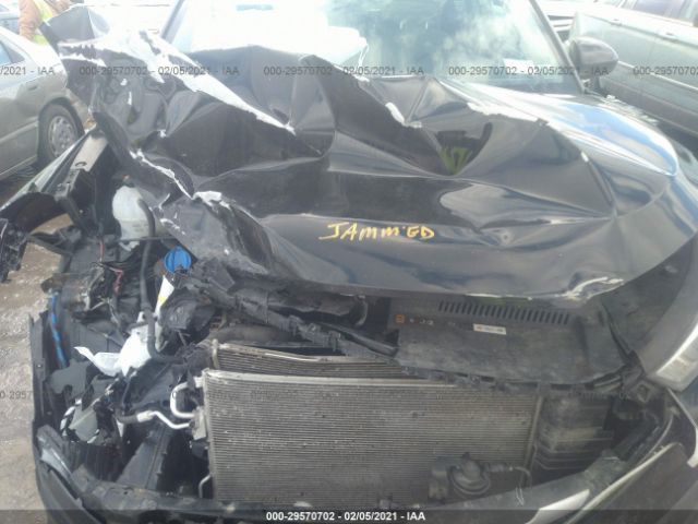 Photo 9 VIN: KM8J3CA40JU722900 - HYUNDAI TUCSON 