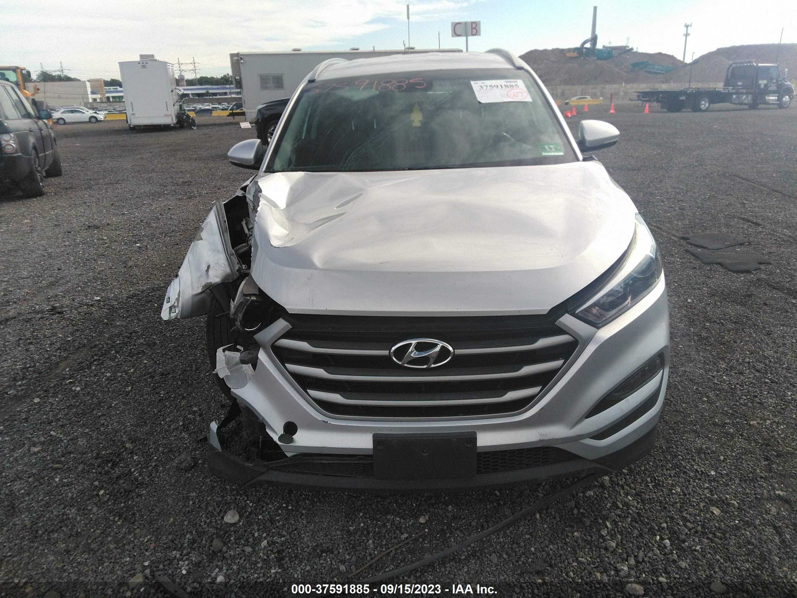 Photo 10 VIN: KM8J3CA40JU730656 - HYUNDAI TUCSON 