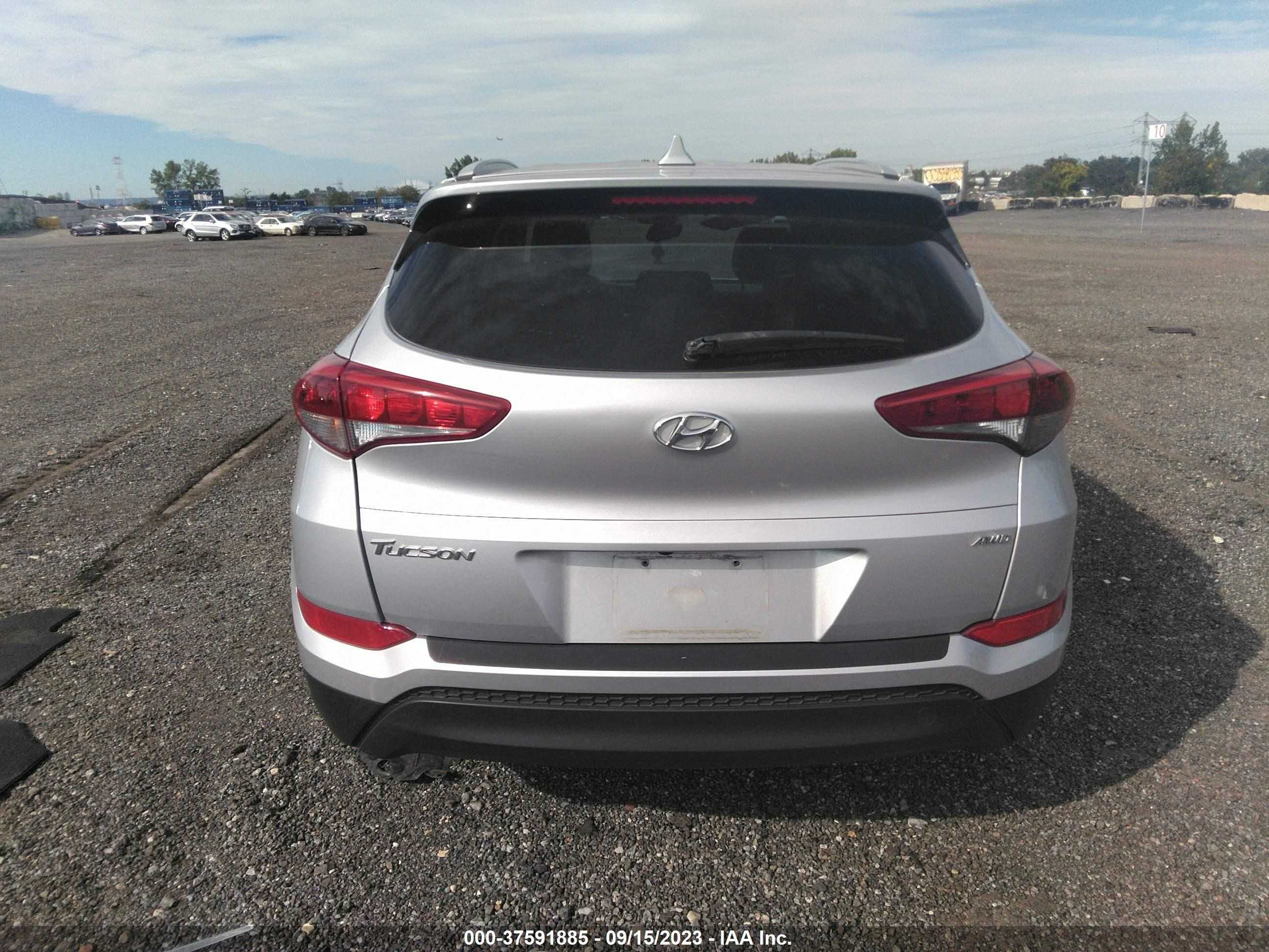 Photo 14 VIN: KM8J3CA40JU730656 - HYUNDAI TUCSON 