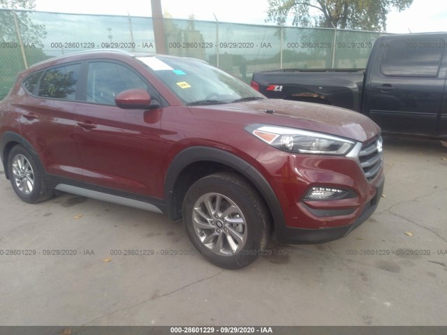 Photo 0 VIN: KM8J3CA40JU783888 - HYUNDAI TUCSON 