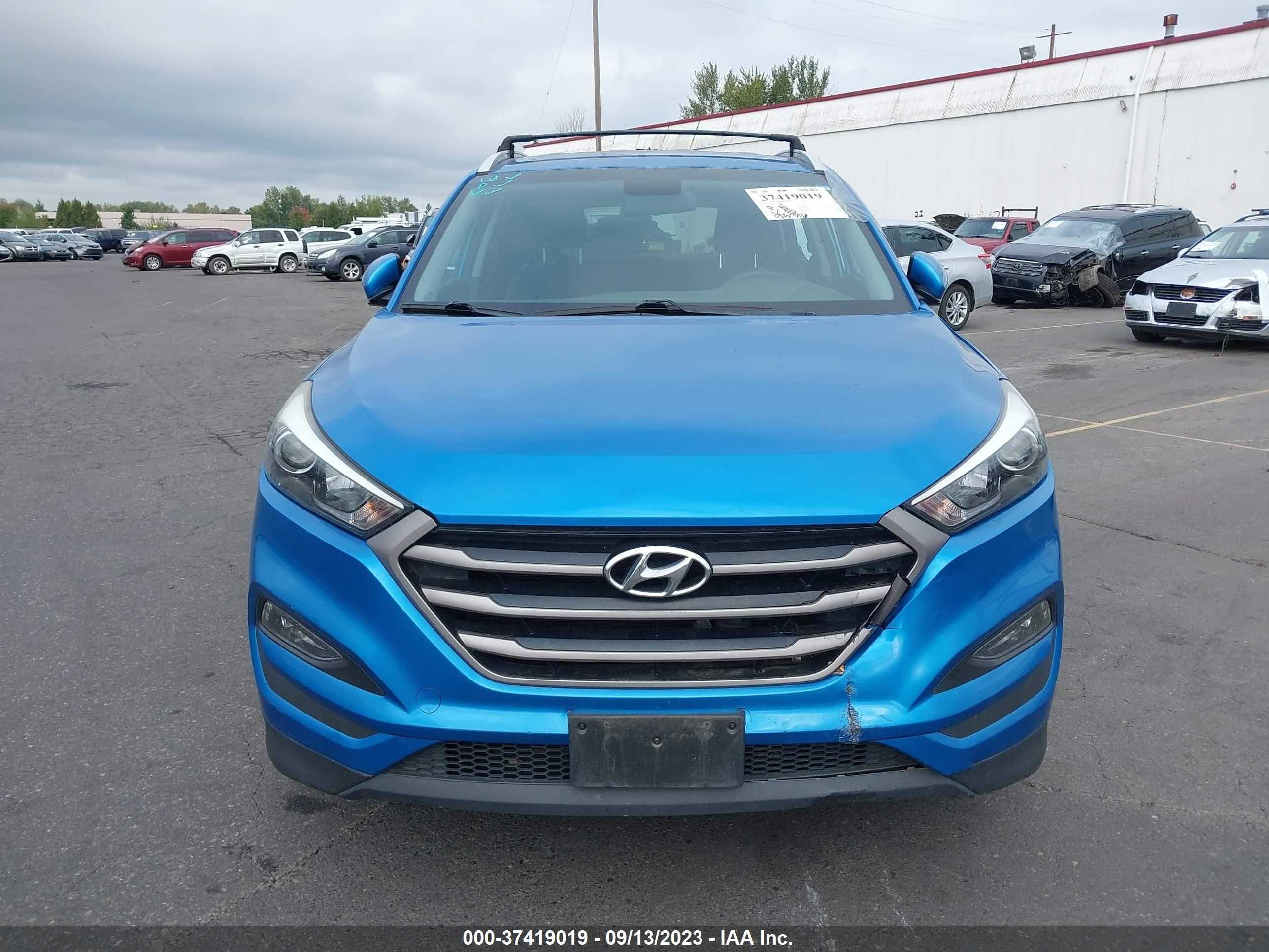 Photo 11 VIN: KM8J3CA41GU173636 - HYUNDAI TUCSON 