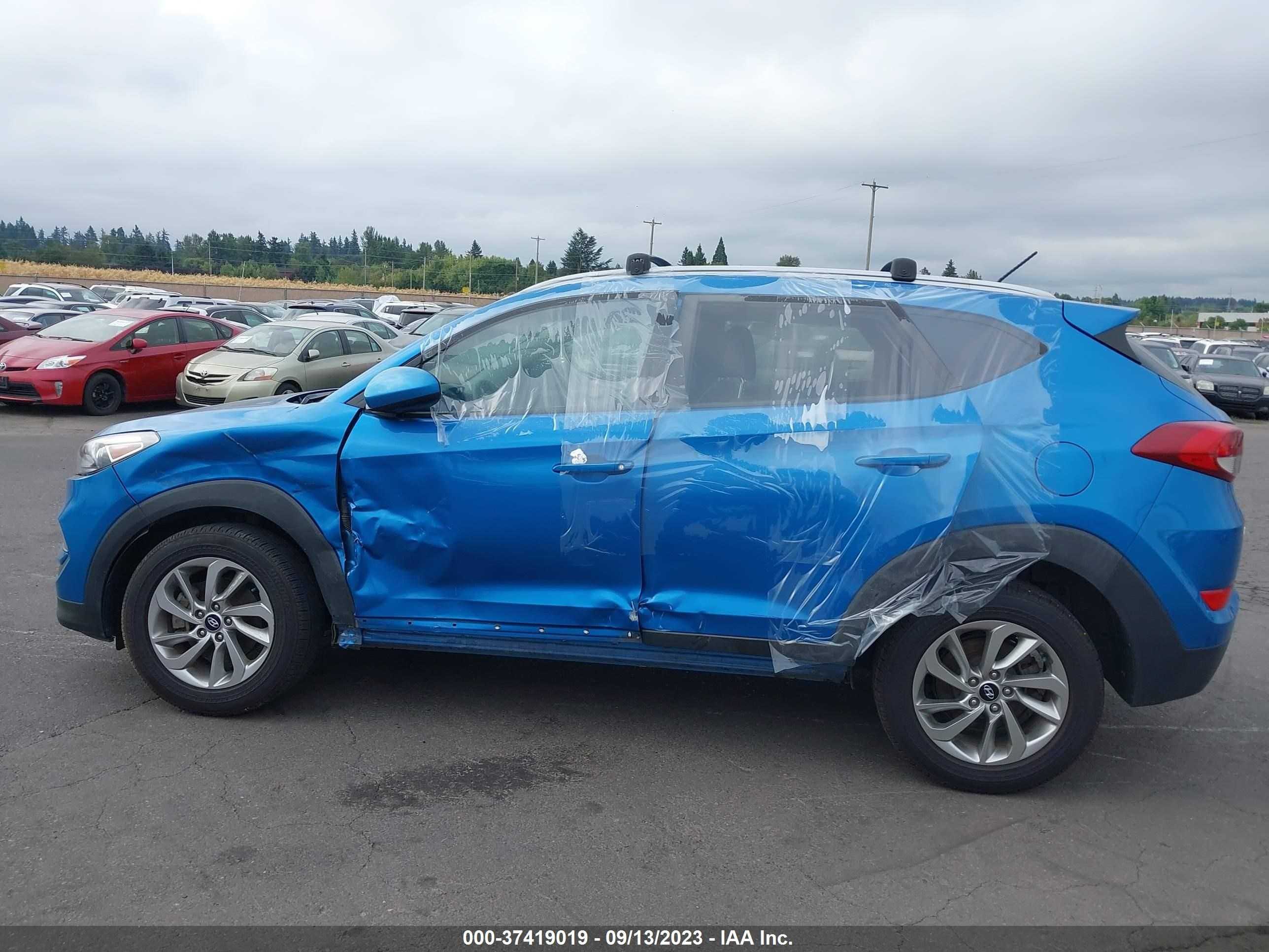 Photo 13 VIN: KM8J3CA41GU173636 - HYUNDAI TUCSON 