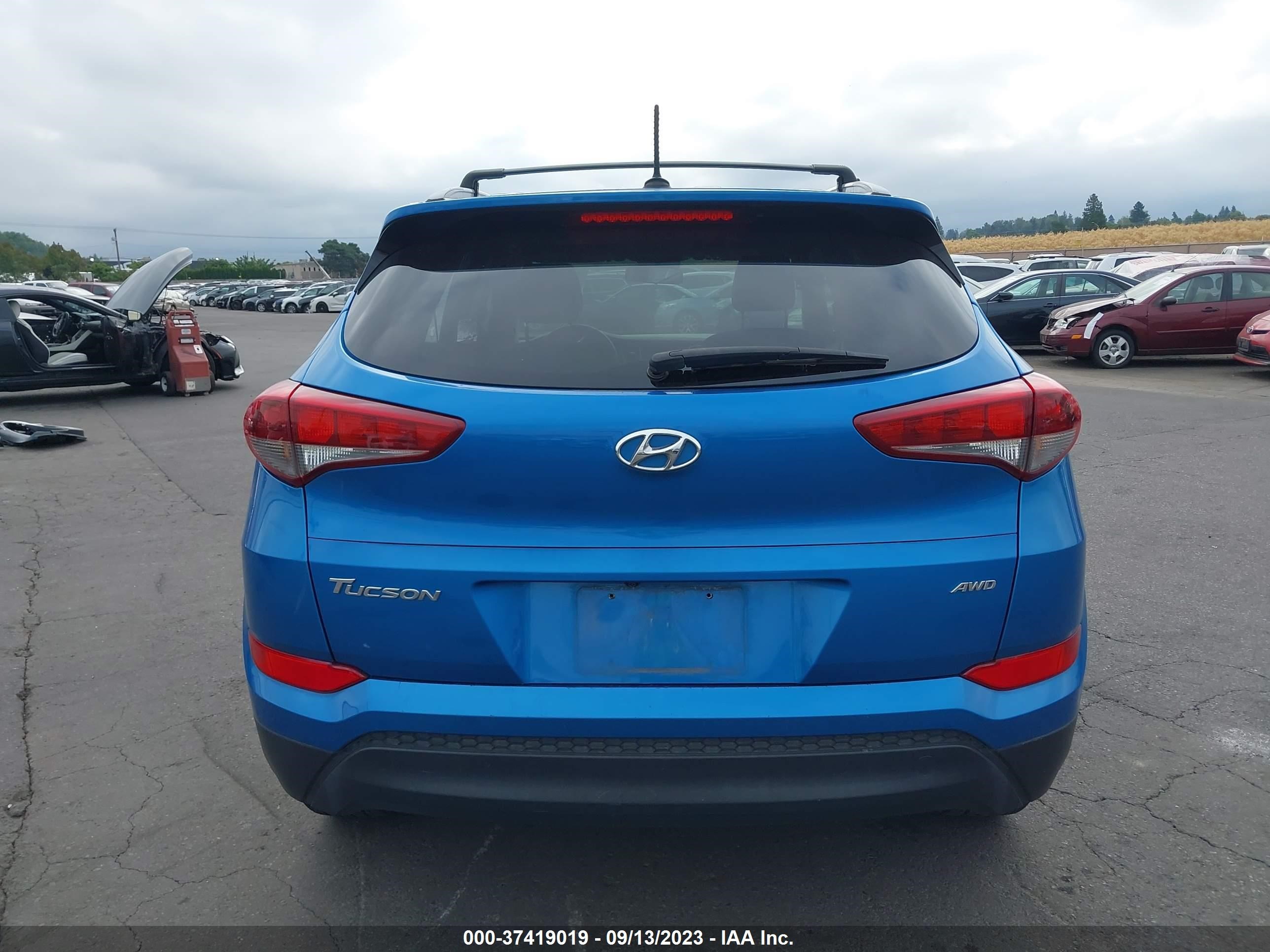 Photo 15 VIN: KM8J3CA41GU173636 - HYUNDAI TUCSON 