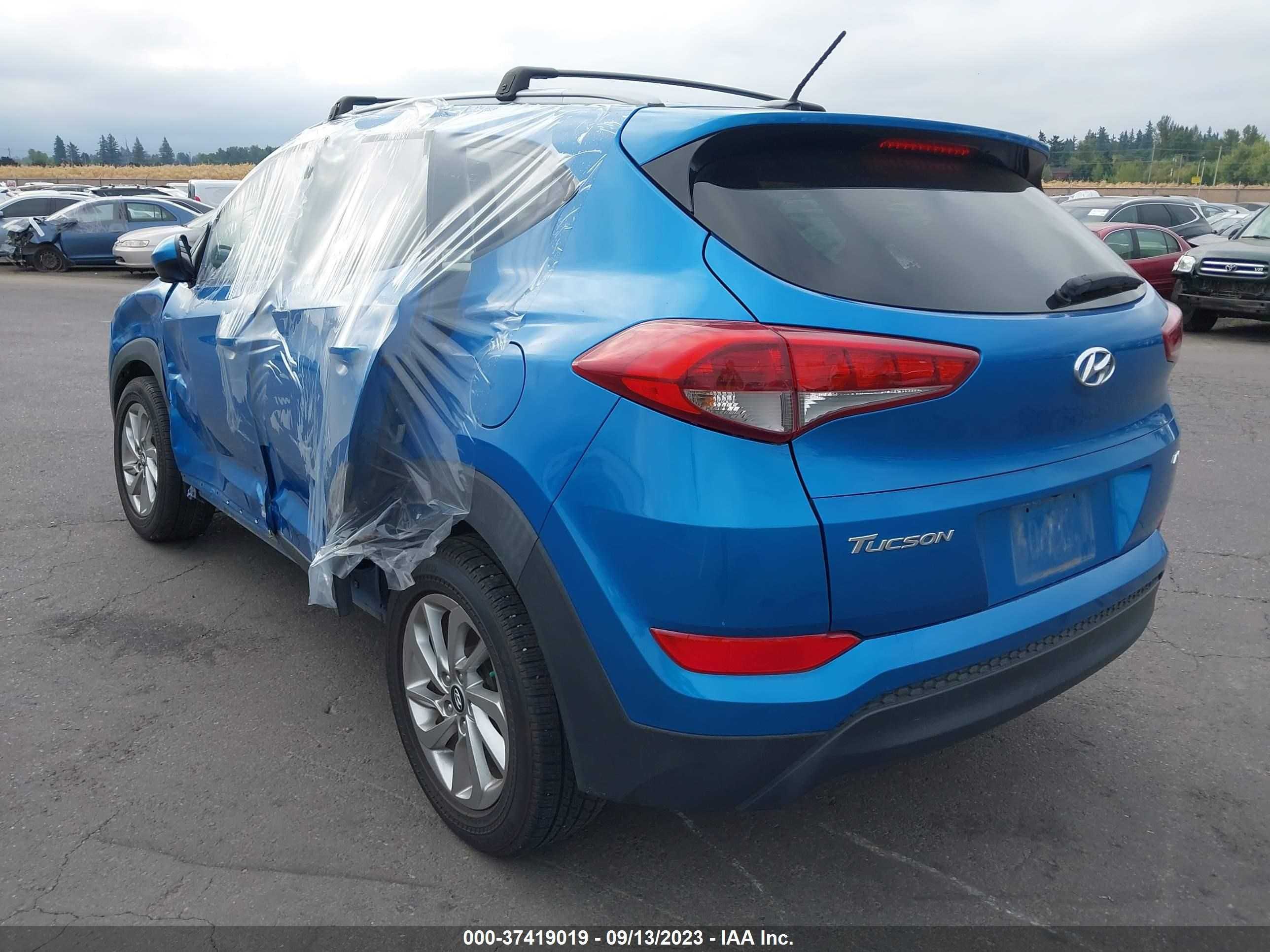 Photo 2 VIN: KM8J3CA41GU173636 - HYUNDAI TUCSON 