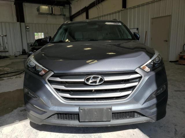 Photo 4 VIN: KM8J3CA41JU610140 - HYUNDAI TUCSON 