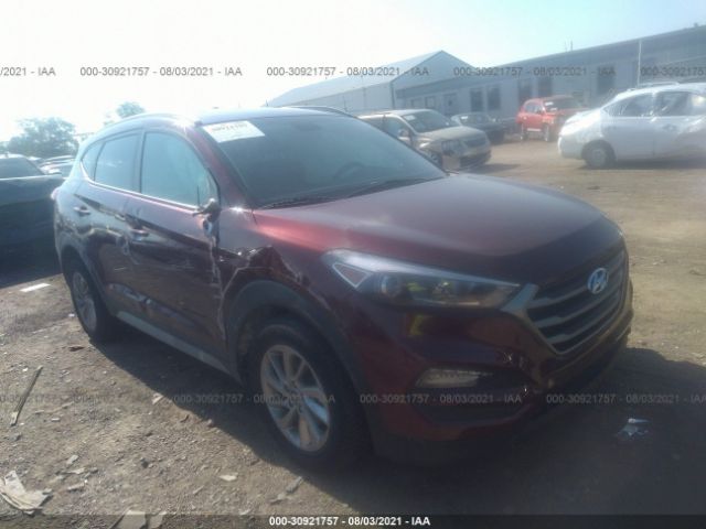 Photo 0 VIN: KM8J3CA41JU627911 - HYUNDAI TUCSON 