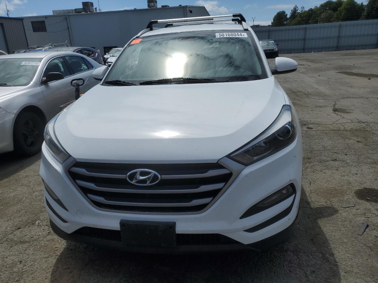 Photo 4 VIN: KM8J3CA41JU690801 - HYUNDAI TUCSON 