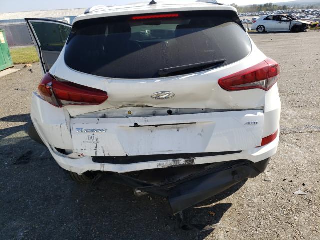 Photo 8 VIN: KM8J3CA42GU258999 - HYUNDAI TUCSON 