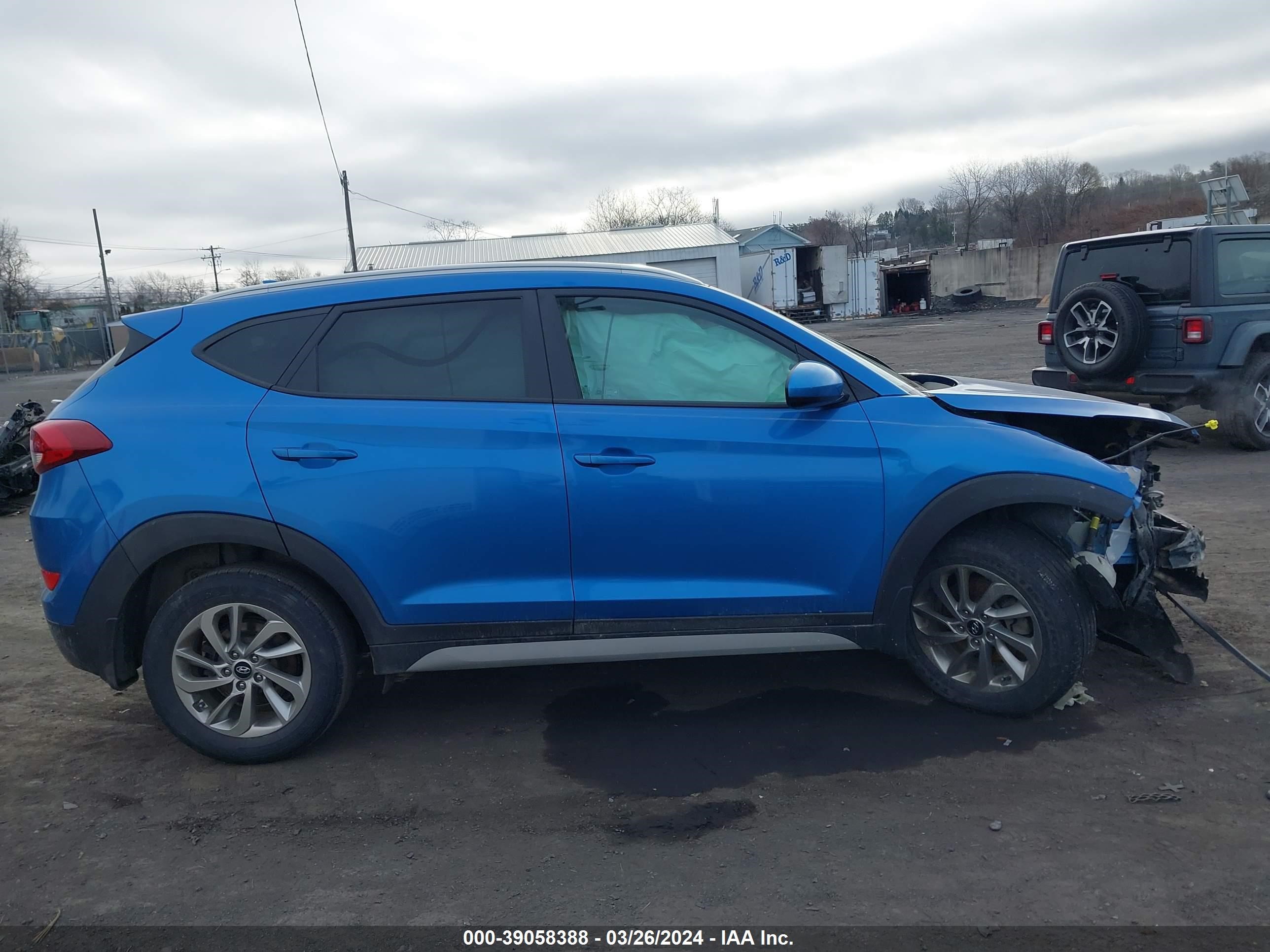 Photo 12 VIN: KM8J3CA42JU624645 - HYUNDAI TUCSON 