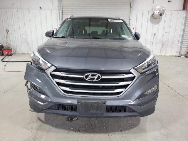 Photo 4 VIN: KM8J3CA42JU811044 - HYUNDAI TUCSON 