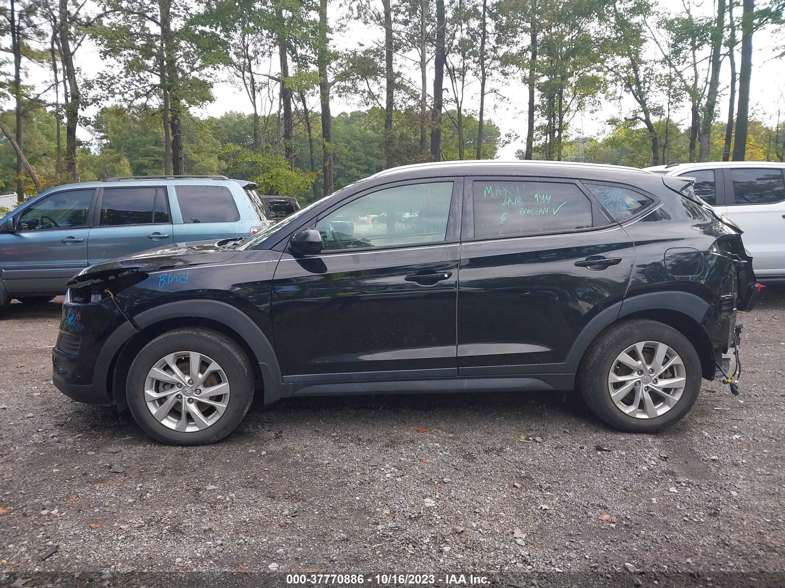 Photo 13 VIN: KM8J3CA42LU157049 - HYUNDAI TUCSON 