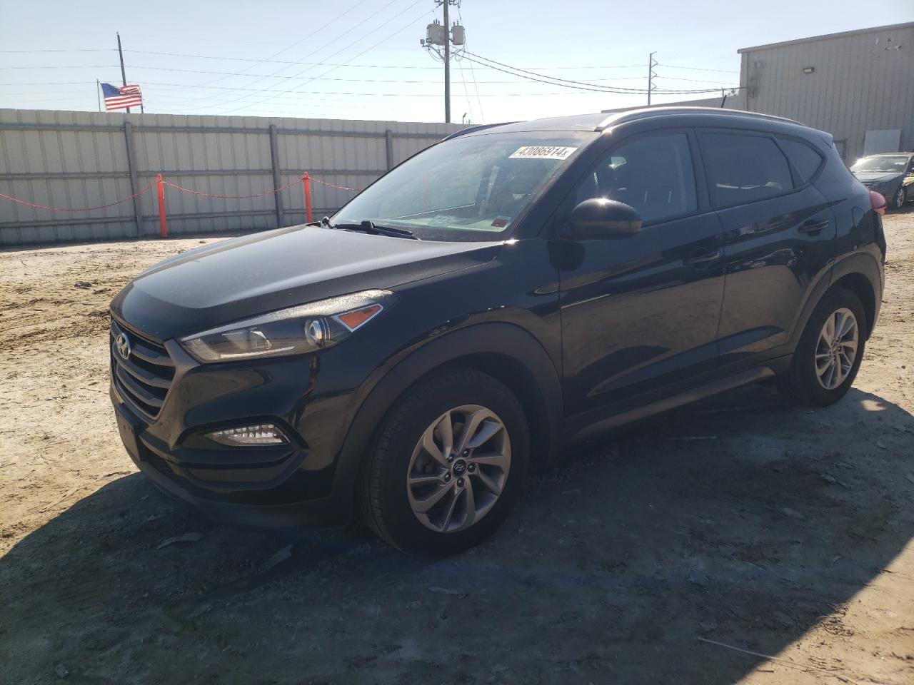 Photo 0 VIN: KM8J3CA43GU248059 - HYUNDAI TUCSON 