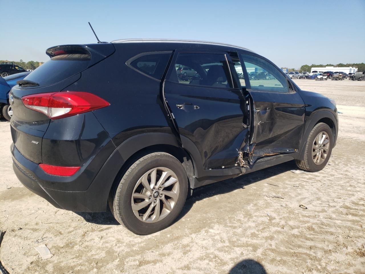 Photo 2 VIN: KM8J3CA43GU248059 - HYUNDAI TUCSON 