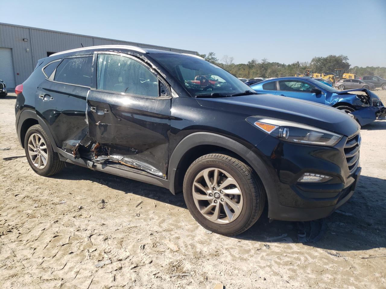 Photo 3 VIN: KM8J3CA43GU248059 - HYUNDAI TUCSON 