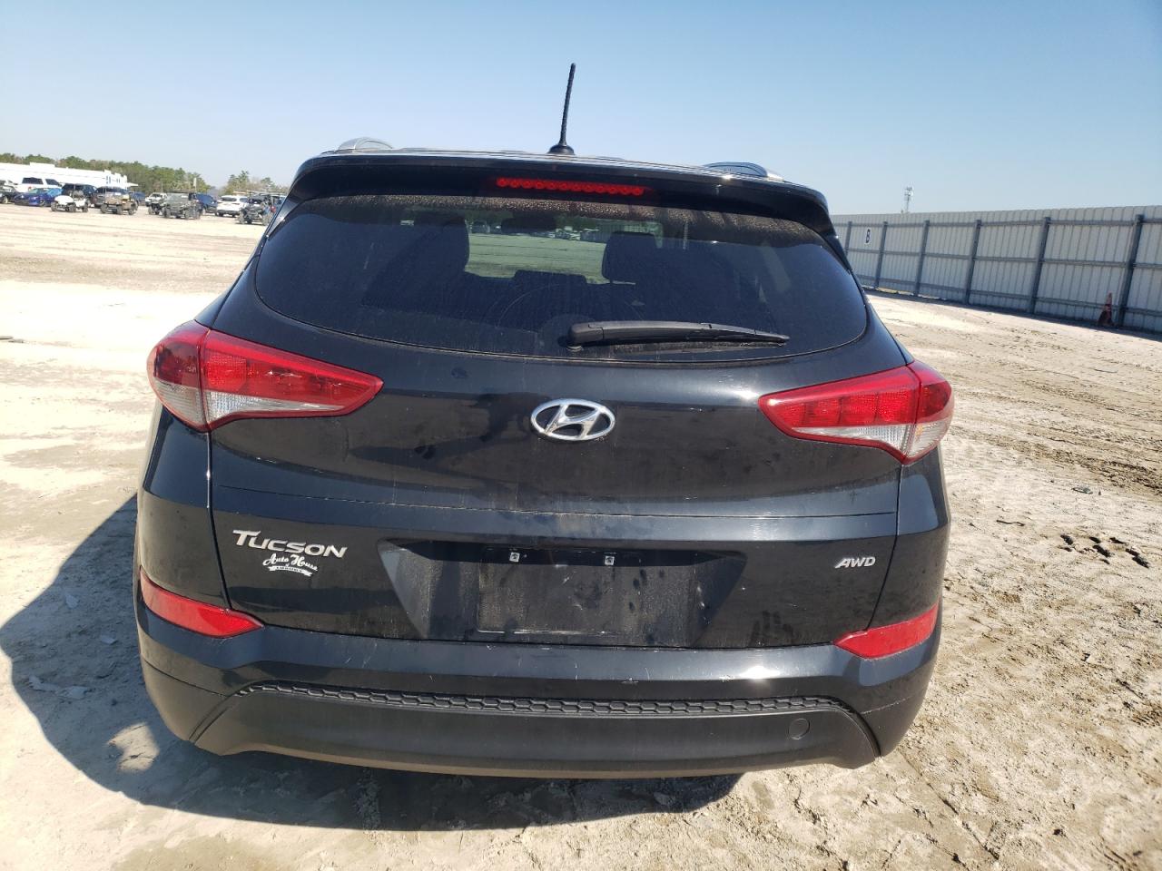 Photo 5 VIN: KM8J3CA43GU248059 - HYUNDAI TUCSON 