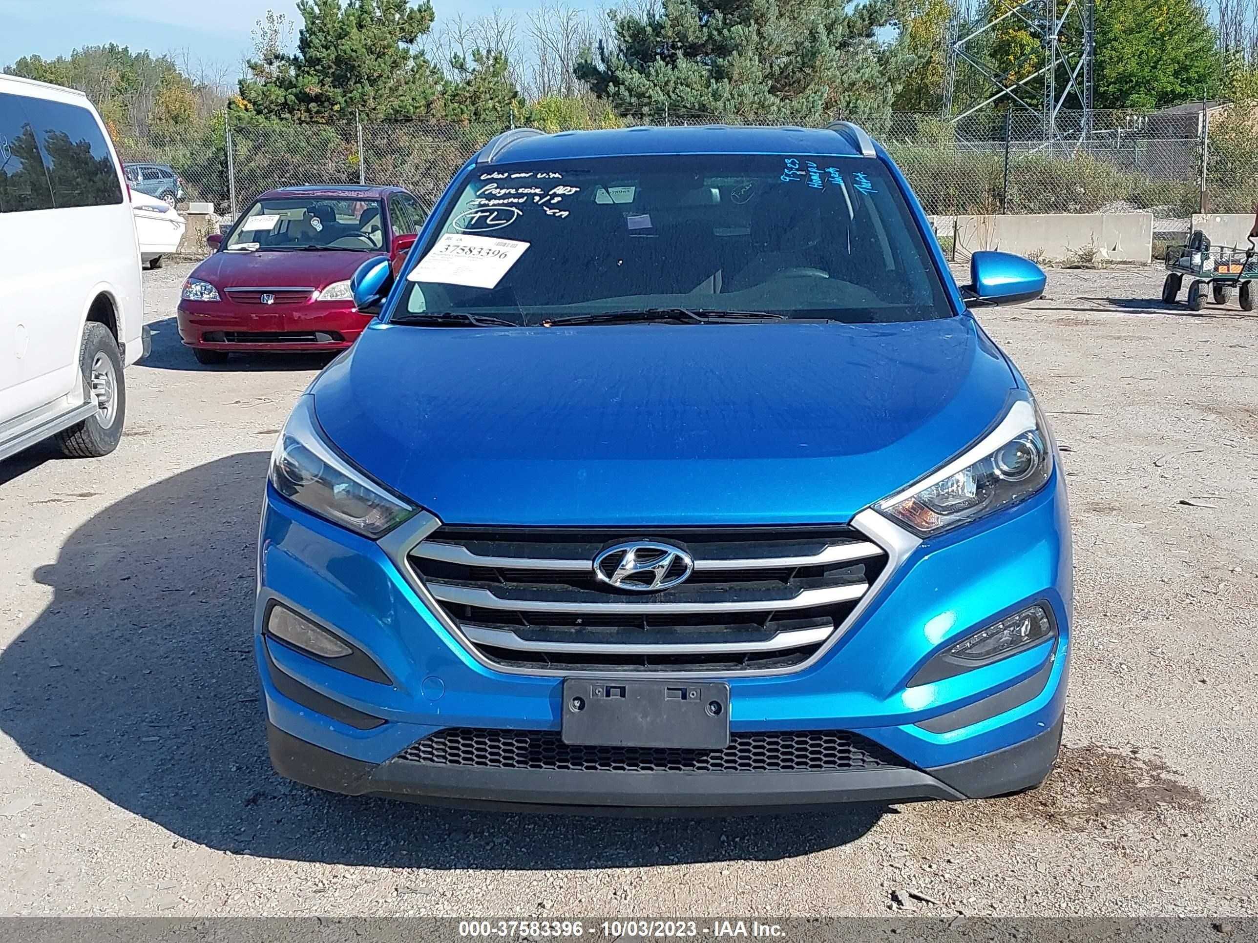 Photo 11 VIN: KM8J3CA43JU602444 - HYUNDAI TUCSON 