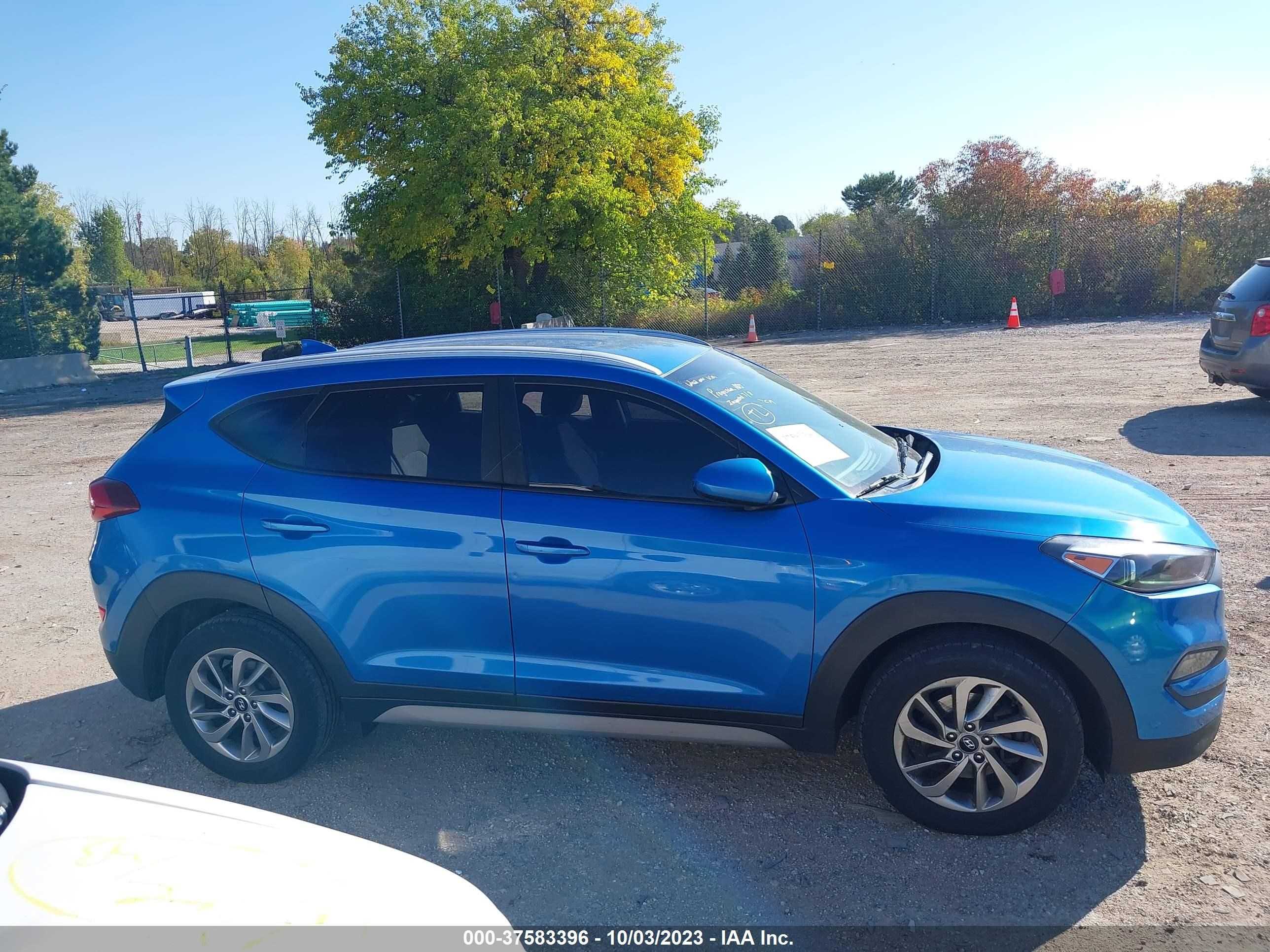 Photo 12 VIN: KM8J3CA43JU602444 - HYUNDAI TUCSON 