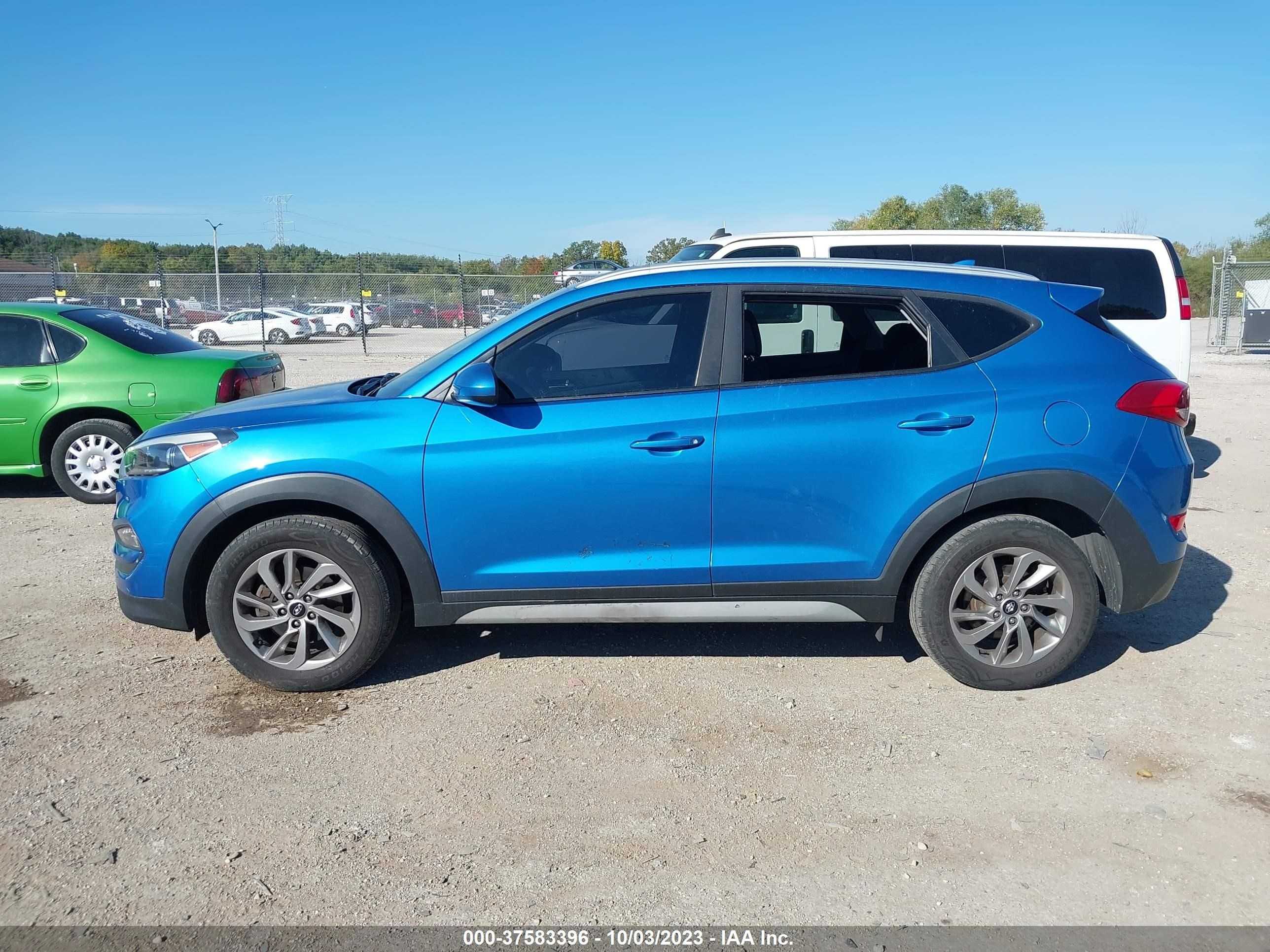 Photo 13 VIN: KM8J3CA43JU602444 - HYUNDAI TUCSON 