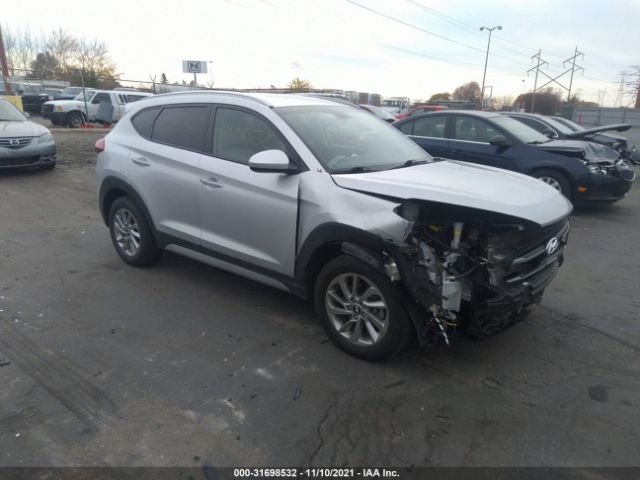 Photo 0 VIN: KM8J3CA43JU627795 - HYUNDAI TUCSON 