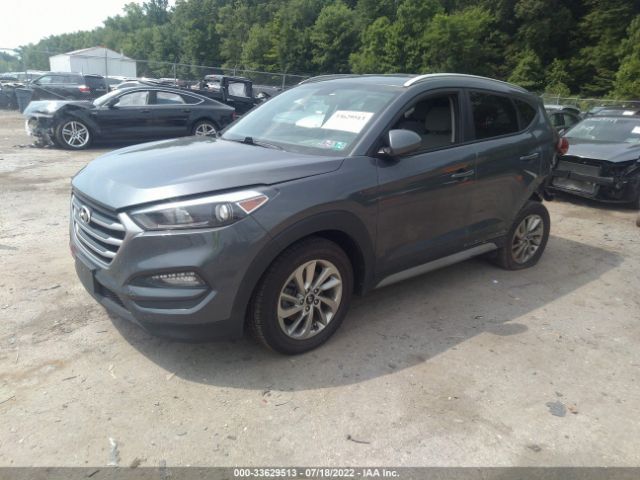 Photo 1 VIN: KM8J3CA43JU679850 - HYUNDAI TUCSON 