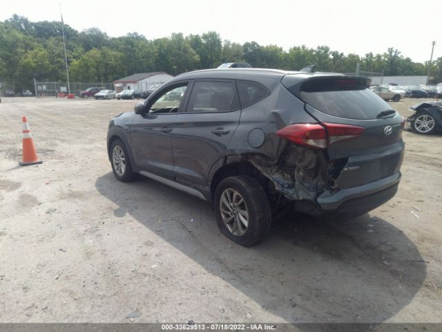 Photo 2 VIN: KM8J3CA43JU679850 - HYUNDAI TUCSON 