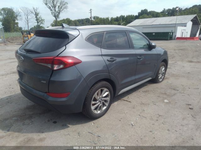 Photo 3 VIN: KM8J3CA43JU679850 - HYUNDAI TUCSON 