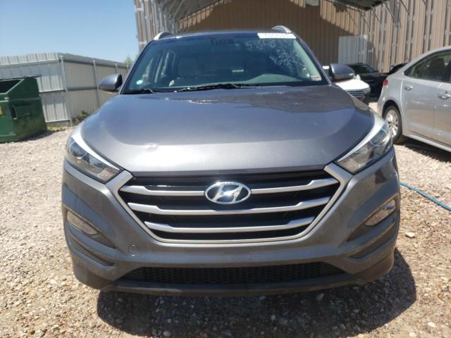 Photo 4 VIN: KM8J3CA43JU747189 - HYUNDAI TUCSON 