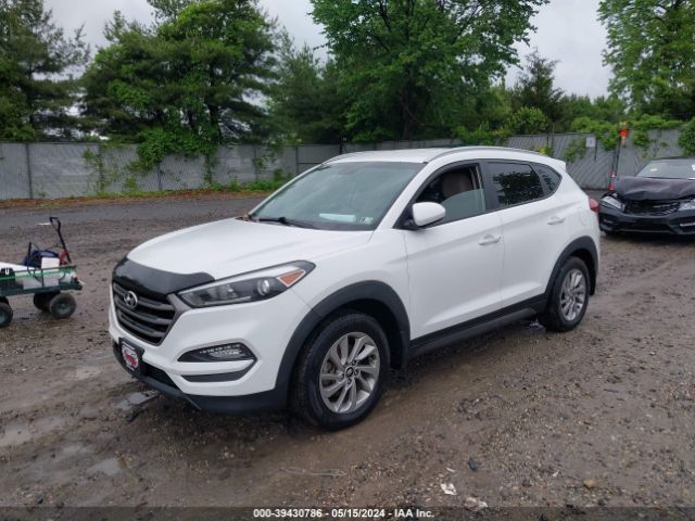 Photo 1 VIN: KM8J3CA44GU062823 - HYUNDAI TUCSON 